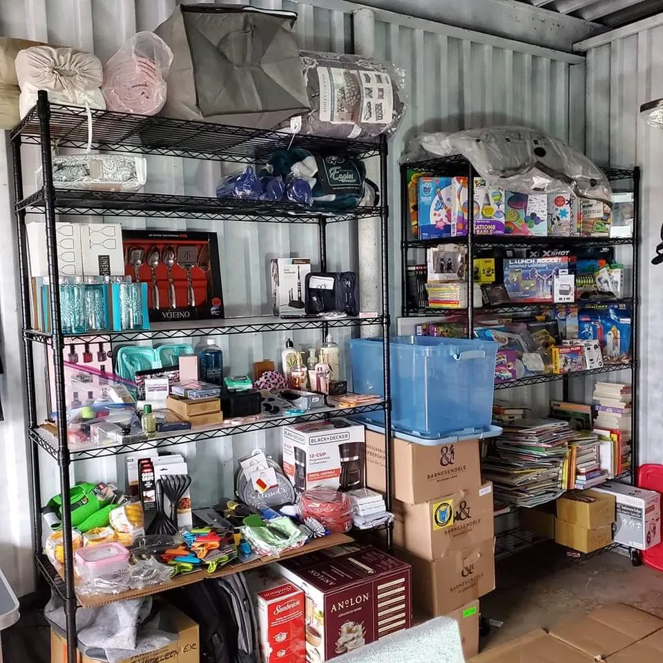 Filling shelves with household goods for kids aging out of care
