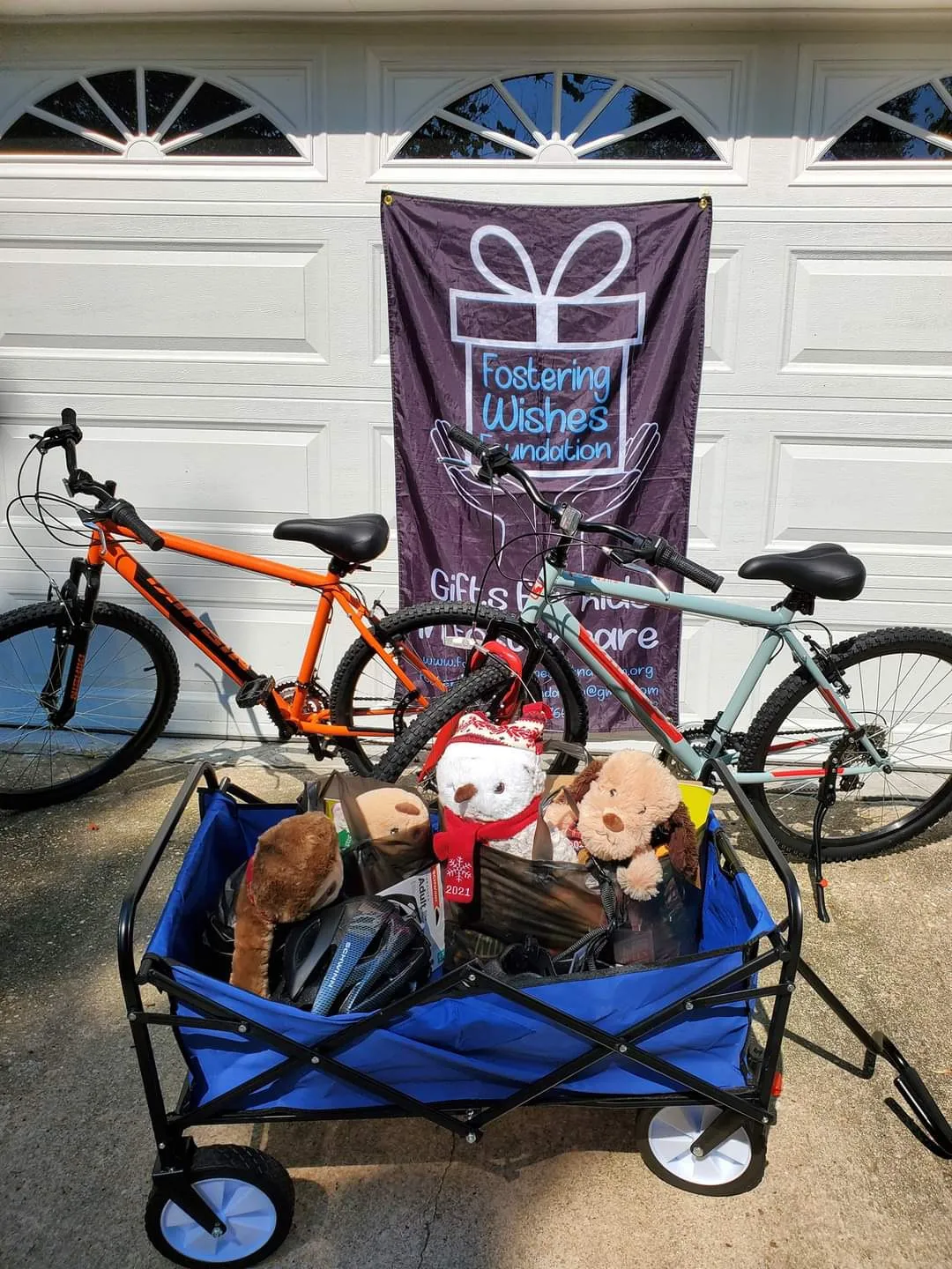 Two foster brothers, newly moved, with their bike wishes granted